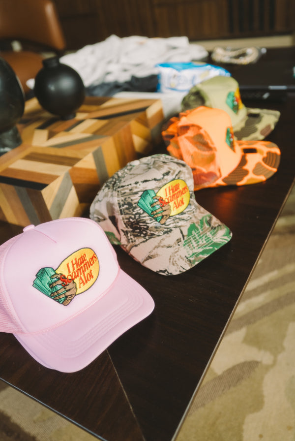 I Hate Scammers Alot Trucker Hat Orange Camo